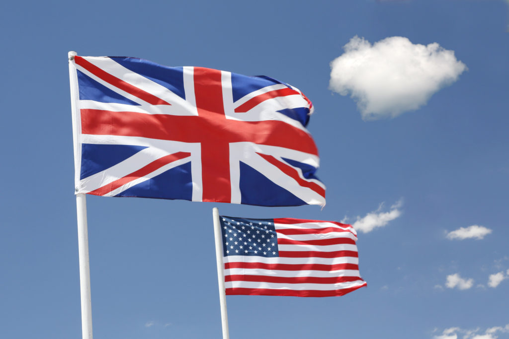 USA. Arizona. Flags of the UK and USA floating in the sky.