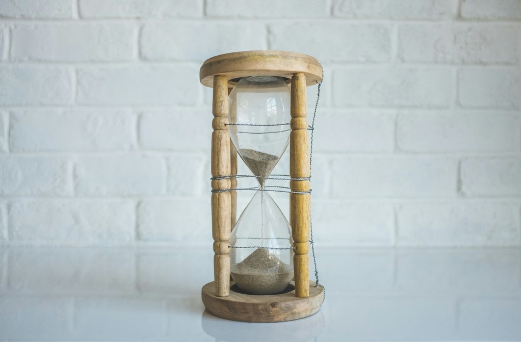 An hourglass on a table