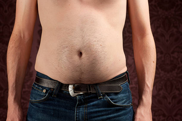 Slim man with a fat belly